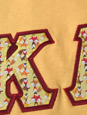 Heather Yellow Gold Crewneck With Foxes In The House On Cardinal Red Twill - JennaBenna